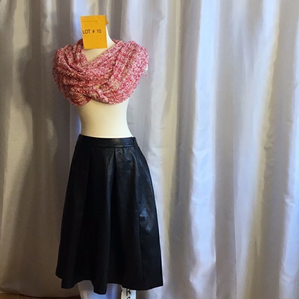 Leather look pleated black skirt in size 6 by WWW